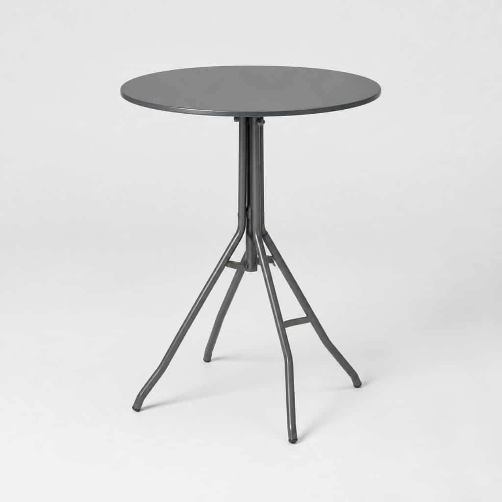 Table haute mange-debout ronde en acier gris vue de trois quarts sur fond neutre